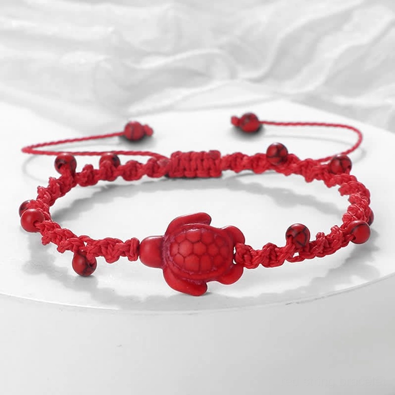 Red string turtle protection bracelet with beaded design
