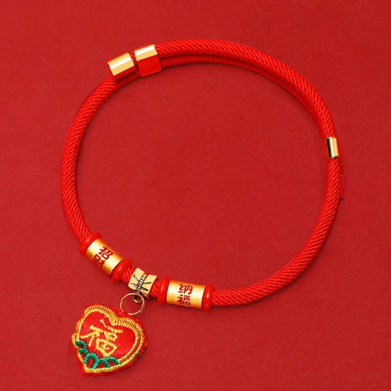 Red woven pet collar with gold character beads and heart-shaped fu character pendant
