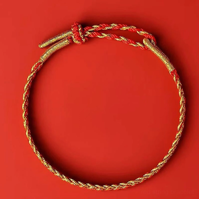 Single red and yellow handwoven luck bracelet full circular view showing adjustable knot on red background