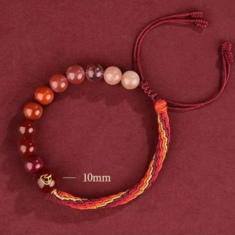 Braided cord reincarnation knot bracelet showing adjustable pull tab closure mechanism