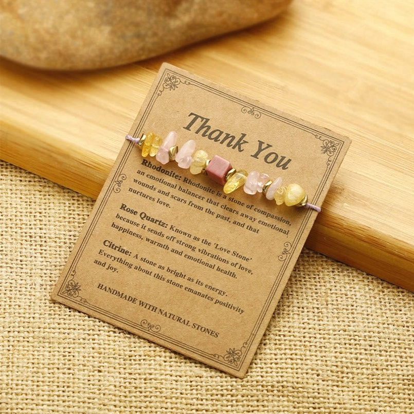 Adjustable love and healing bracelet with gemstone beads on kraft product card