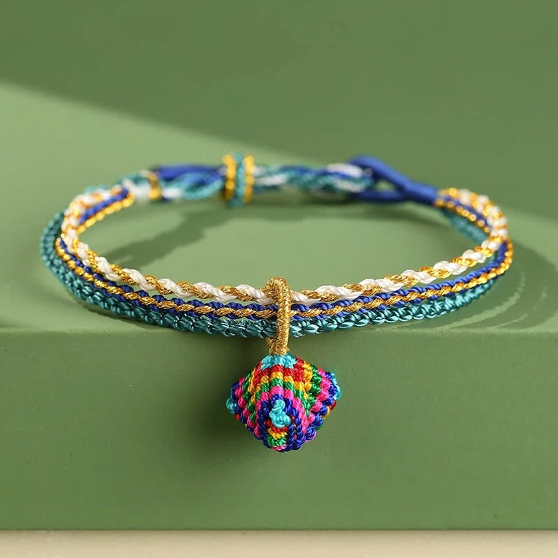 Royal blue Tibetan red string bracelet with handcrafted braiding and protective spiritual energy
