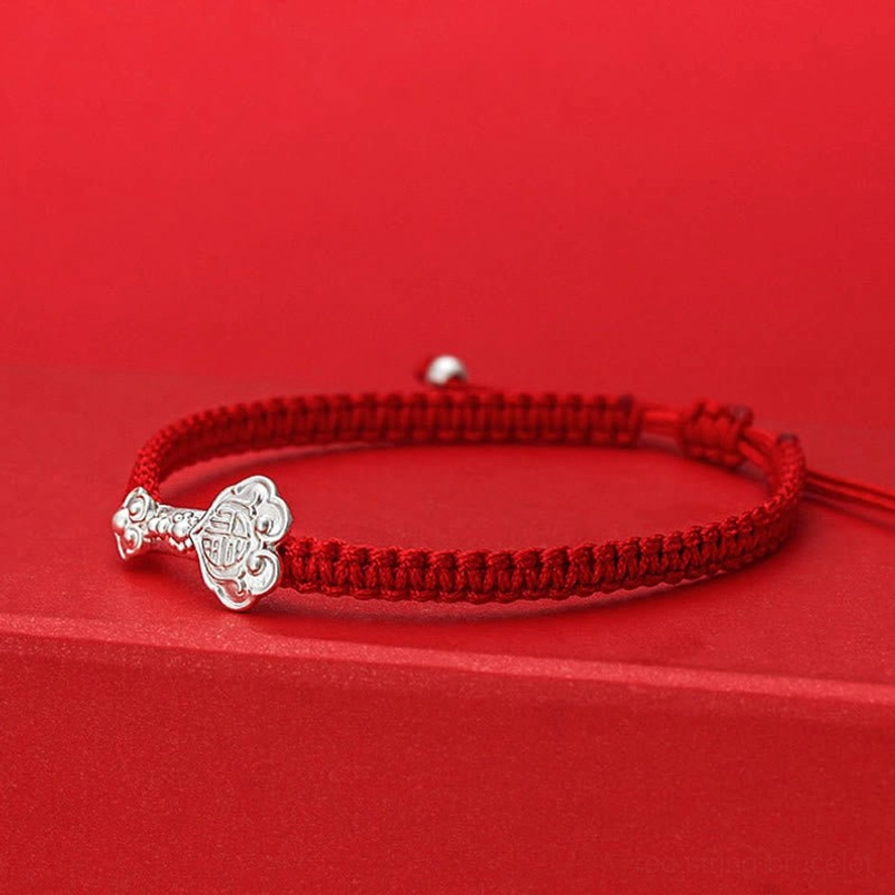Red String Fu Bracelet with 999 Sterling Silver - Side Profile Showing Adjustable Silver Bead Fasteners