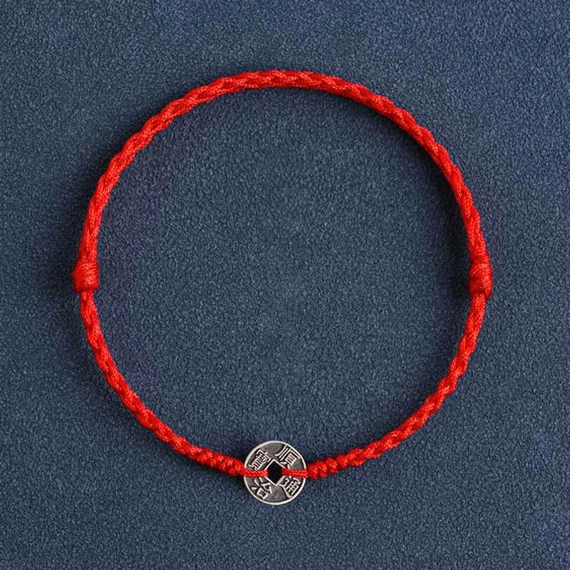 Shunzhi Emperor red string bracelet with ancient silver coin charm on braided cord