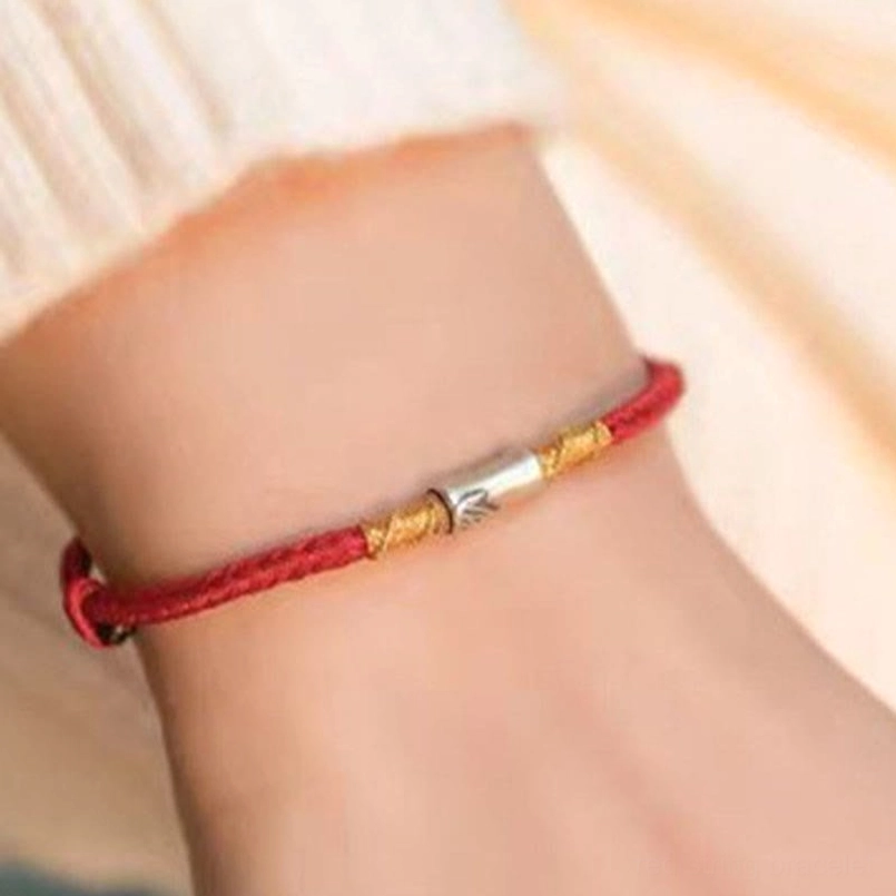Red string 925 sterling silver bracelet front wrist closeup view