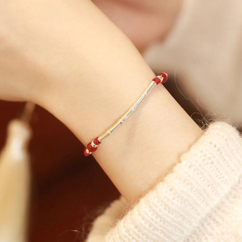 Silver bamboo tube bead long red cord red string protection bracelet detail