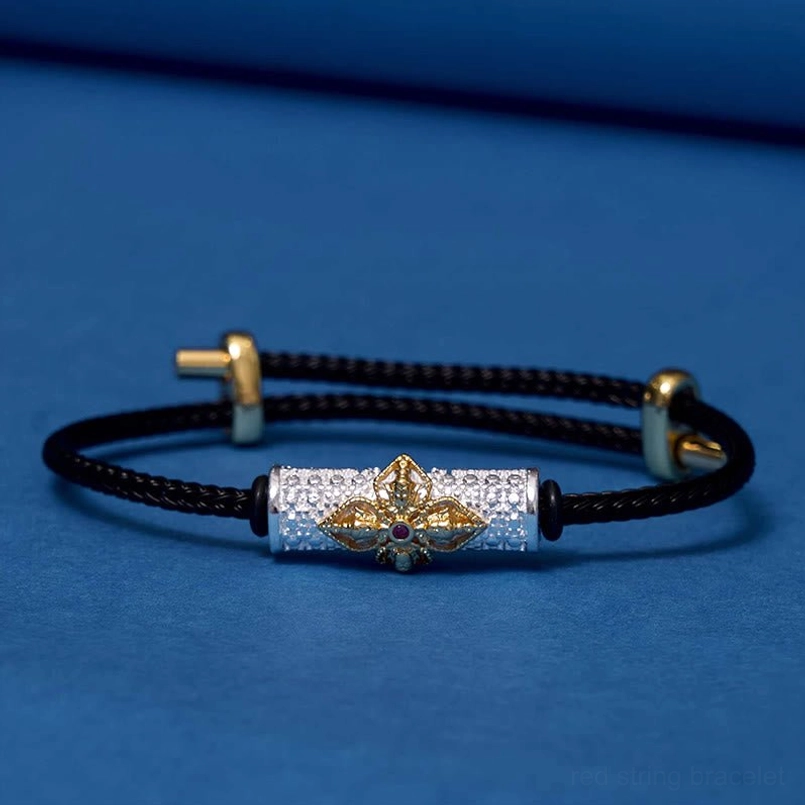 Silver black string luck bracelet with handcrafted copper flower charm