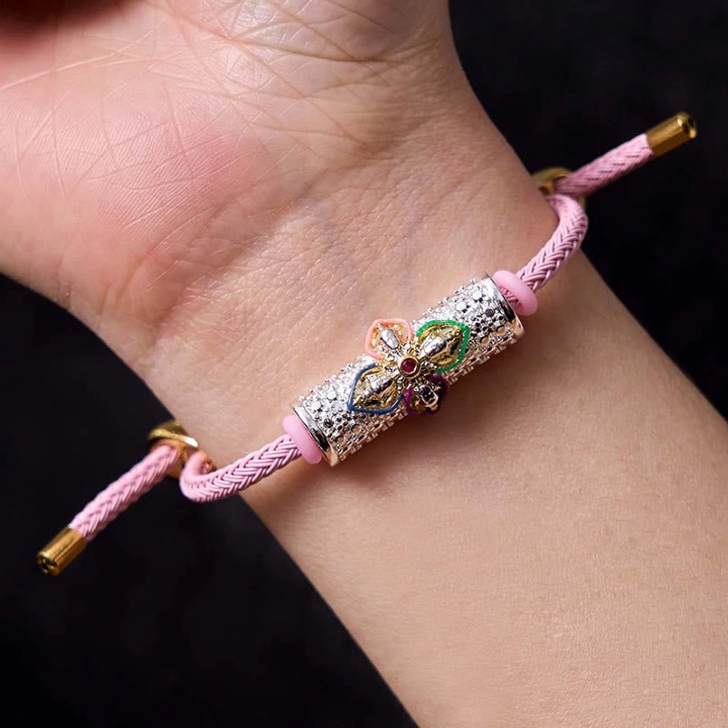Silver colorful flower pink string luck bracelet showing handmade quality