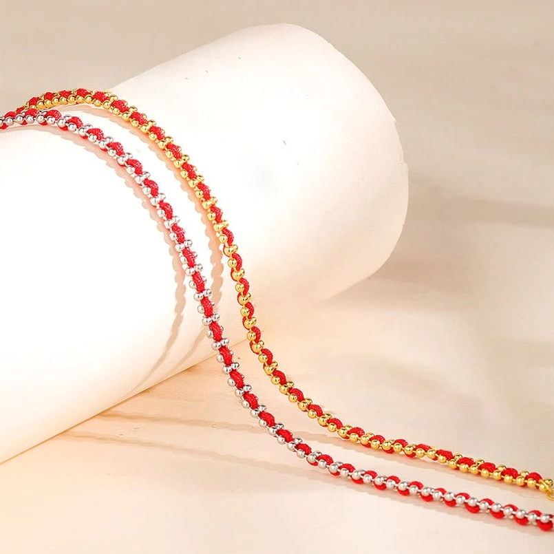 Two styles of red string bracelets silver and gold bead side by side display
