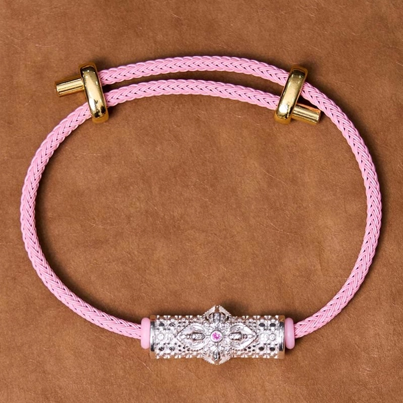 Silver pink string protection bracelet with colorful flower charm display