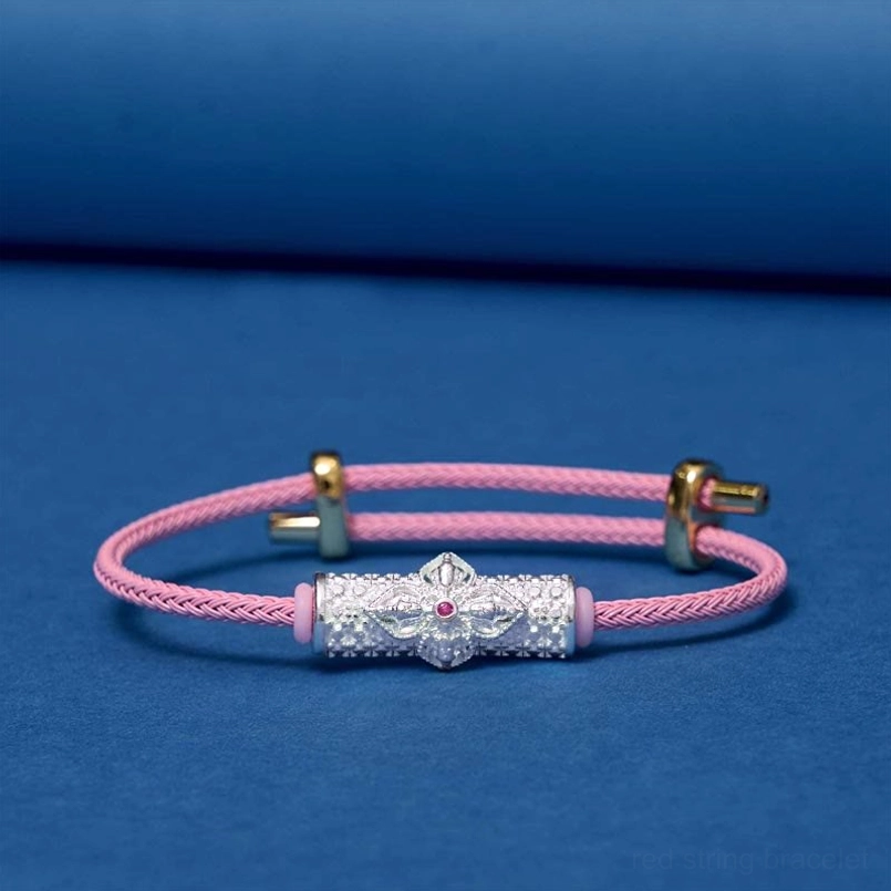 Silver pink string luck bracelet with handmade copper flower charm and enamel details