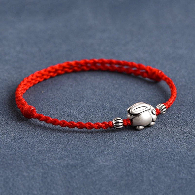 Handmade 999 silver rabbit lucky charm red string bracelet detail view