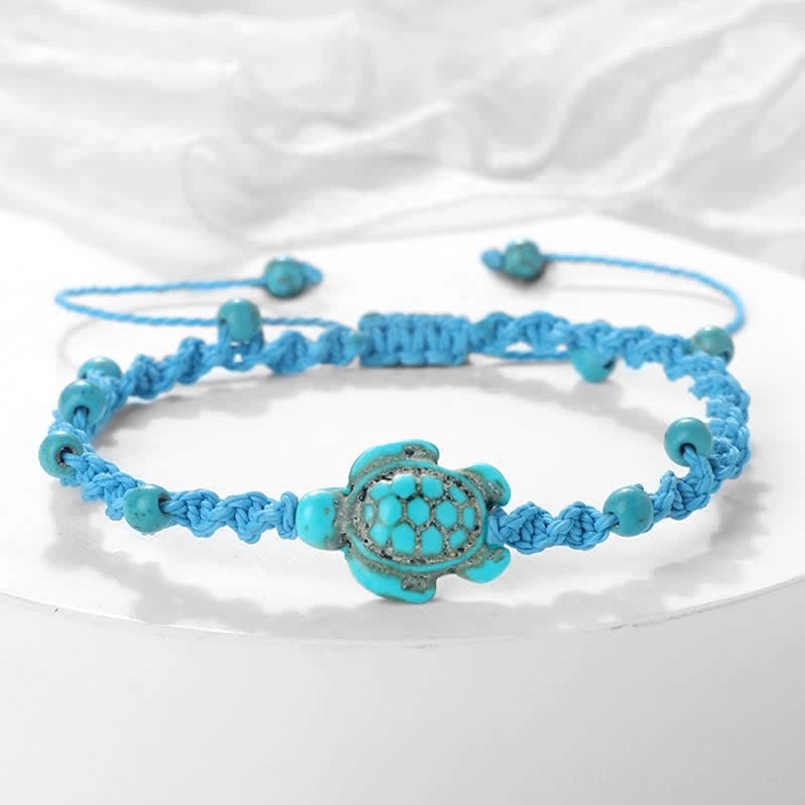 Sky blue turtle braided protection bracelet with natural beads