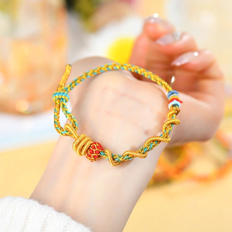 Year of the Snake protection bracelet – close-up of intricate braided string work