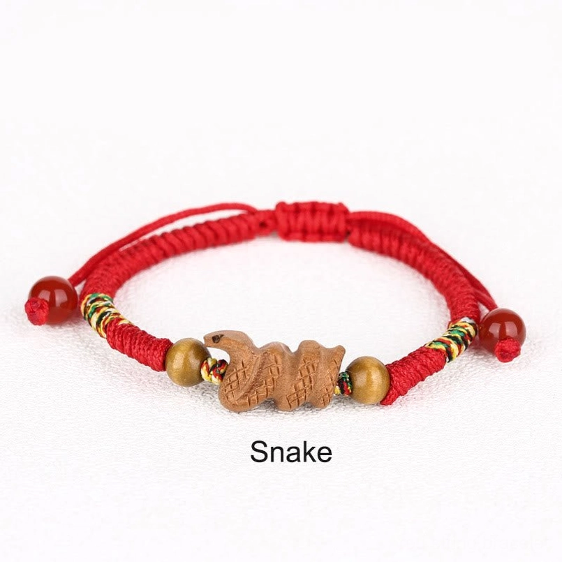 Snake zodiac red string bracelet wisdom charm peach wood
