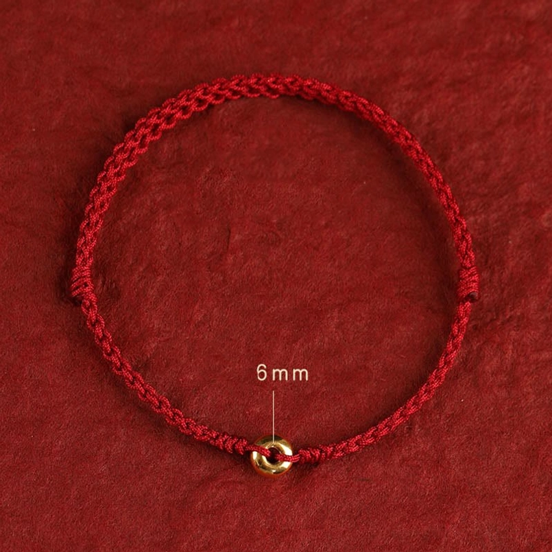 spiritual protection red string bracelet with gold charm detail view