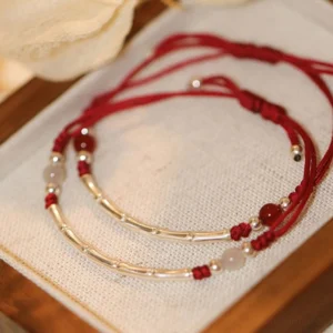 925 sterling silver bamboo red string agate bracelet flat lay collection