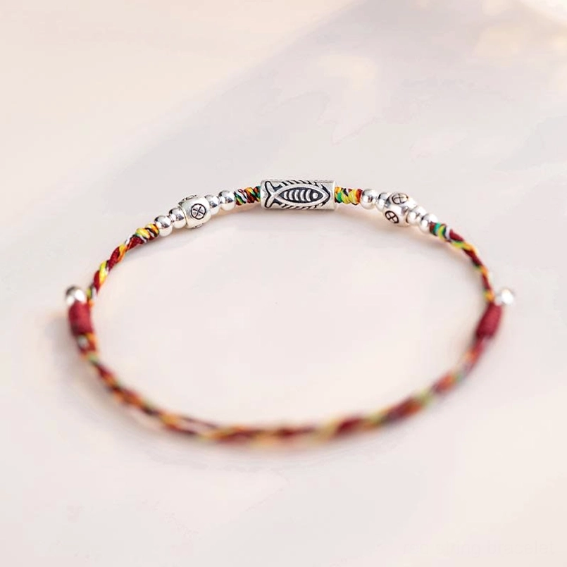 Engraved sterling silver koi fish charm with multicolored braided red string and metal beads