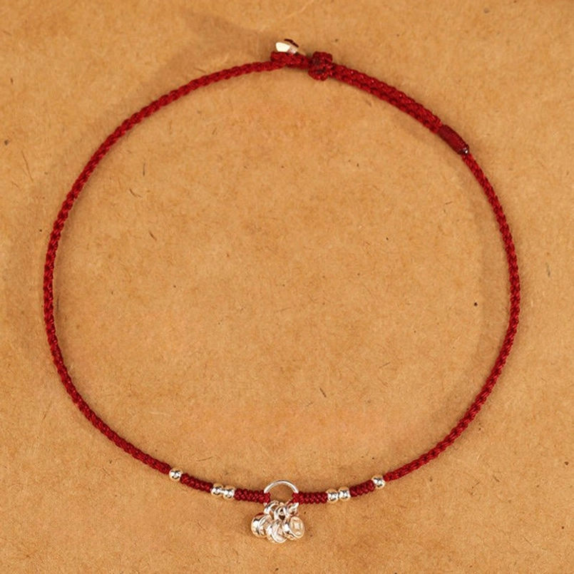 925 sterling silver red string bracelet flat lay front view with copper coin charm and beads