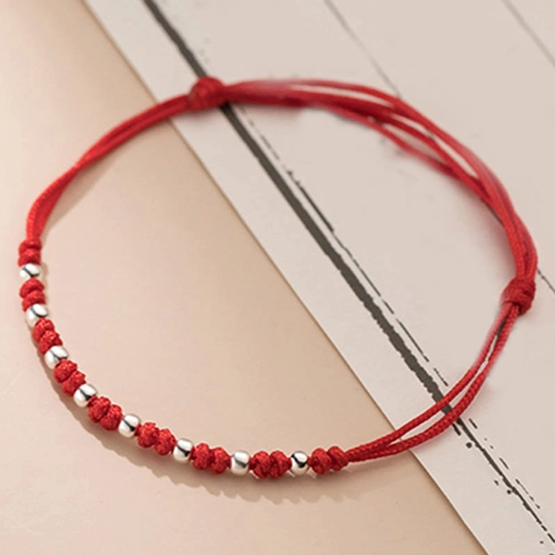 Double-strand red cord bracelet with 925 sterling silver metal beads and sliding knots