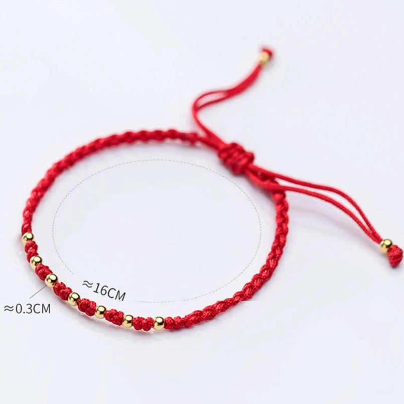 925 sterling silver red string bracelet with gold plated beads flat lay styling