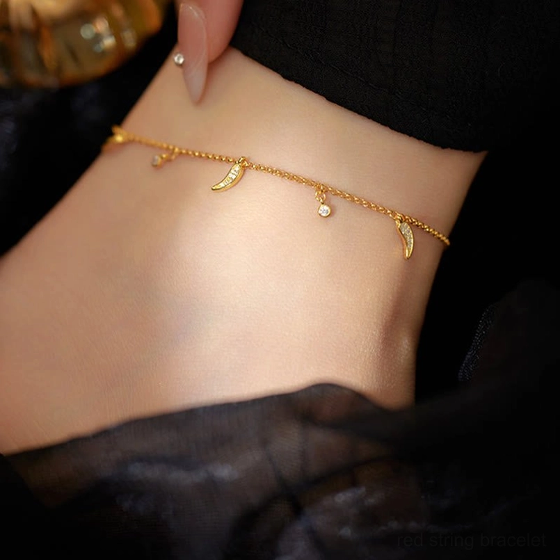 Front ankle view of 925 sterling silver zircon charm anklet - asymmetrical spaced pendant design