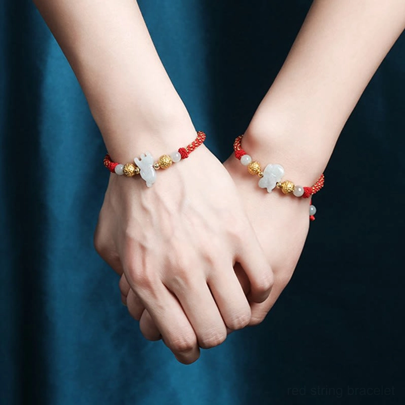 Sterling silver zodiac bracelet with red string jade animal charm