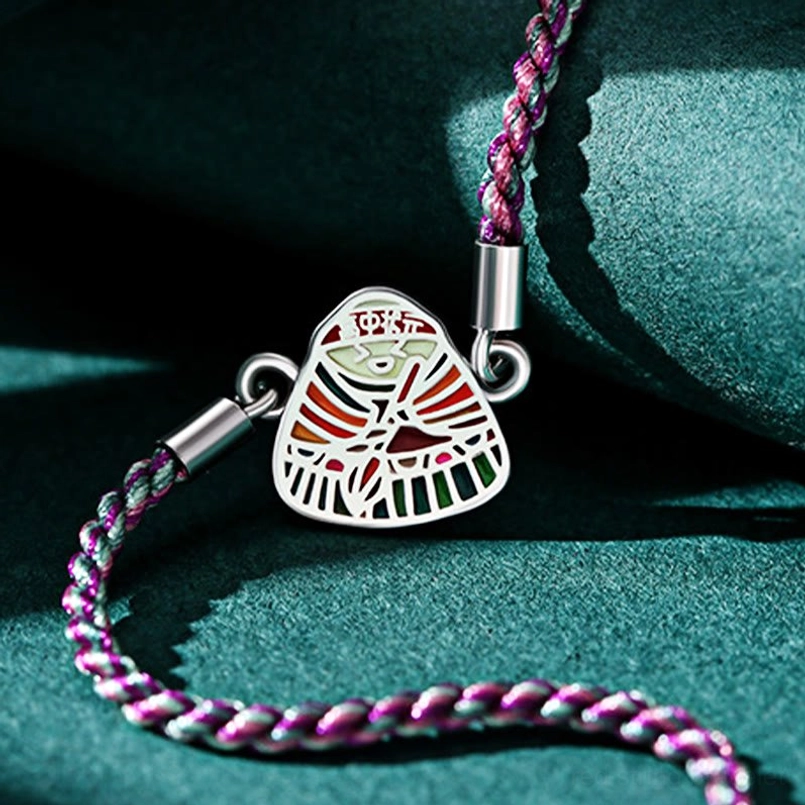 925 sterling silver zongzi charm detail close up of red string bracelet