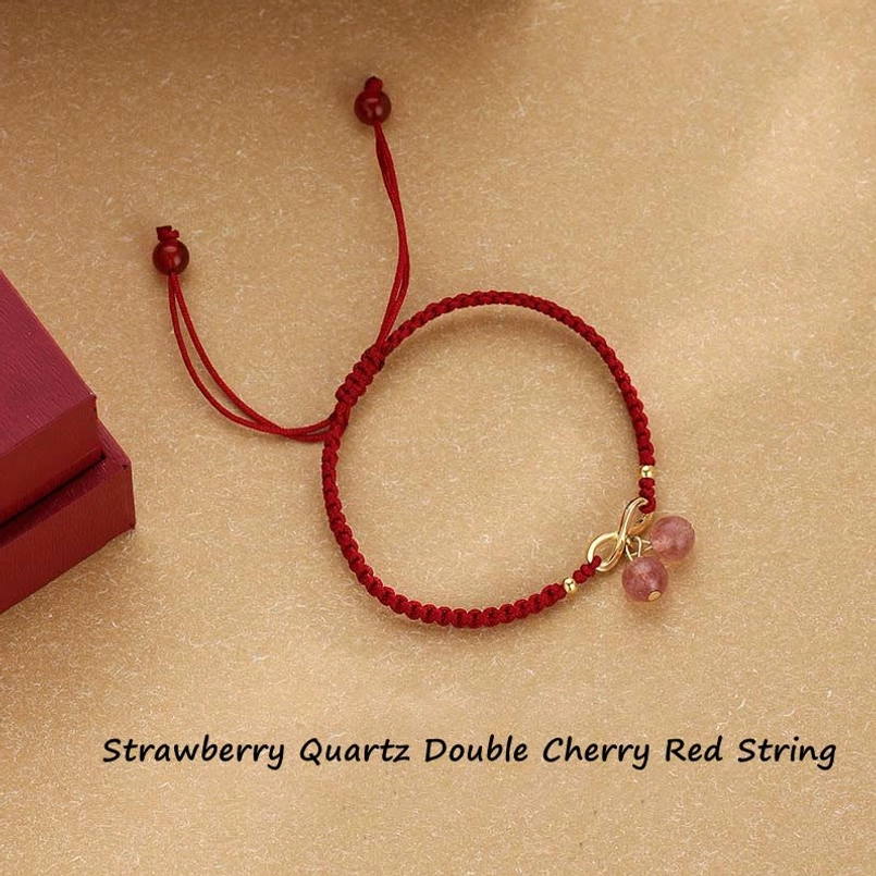 Strawberry quartz endless knot red string bracelet flat lay with adjustable tie closure on light background