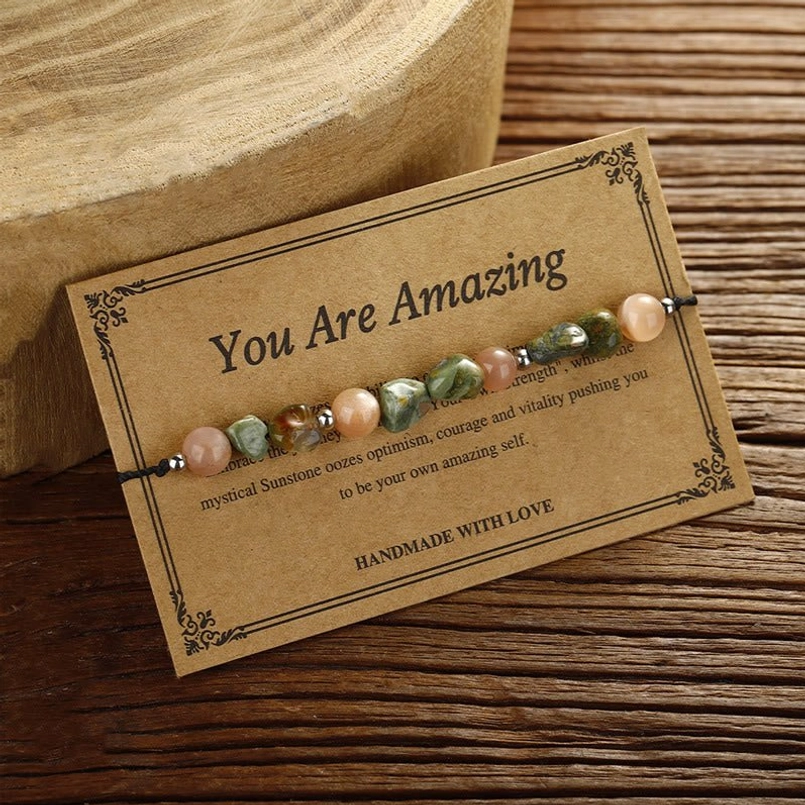Handcrafted Sunstone Rhyolite bracelet side angle with sliding knot closure