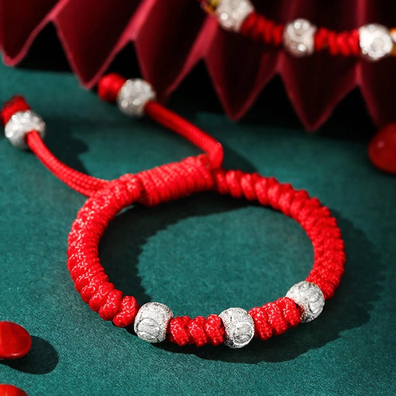 Thick twisted red string bracelet for kids with engraved sterling silver beads and adjustable pull-tie closure