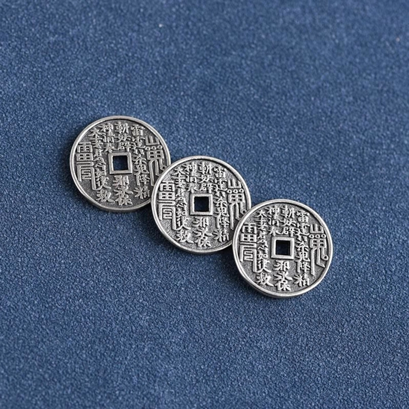 Three antique sterling silver coins with Chinese inscriptions and square holes