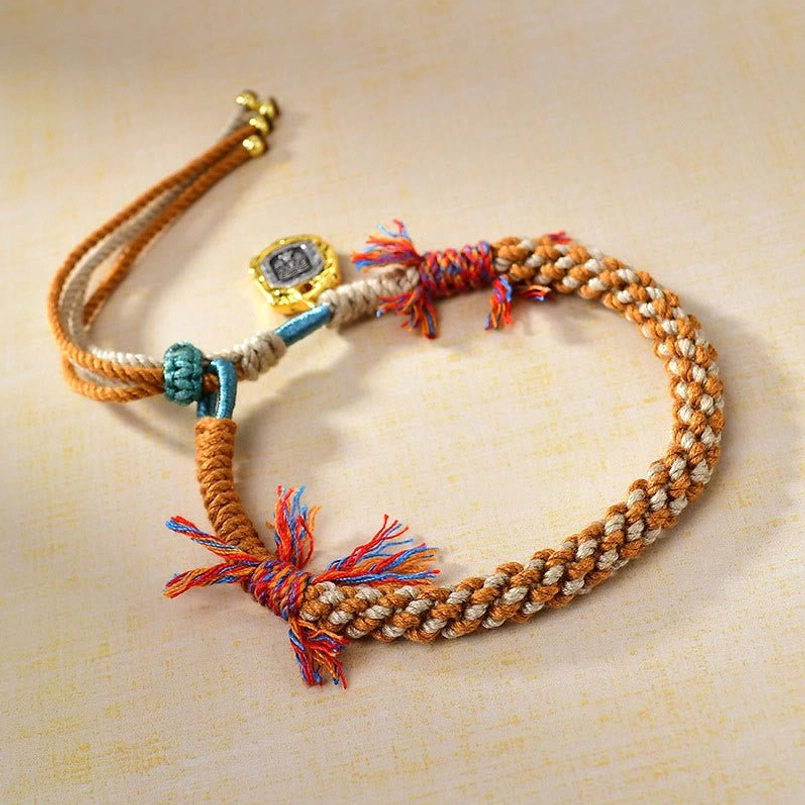 Adjustable Tibetan lucky red string bracelet with colorful tassels side view