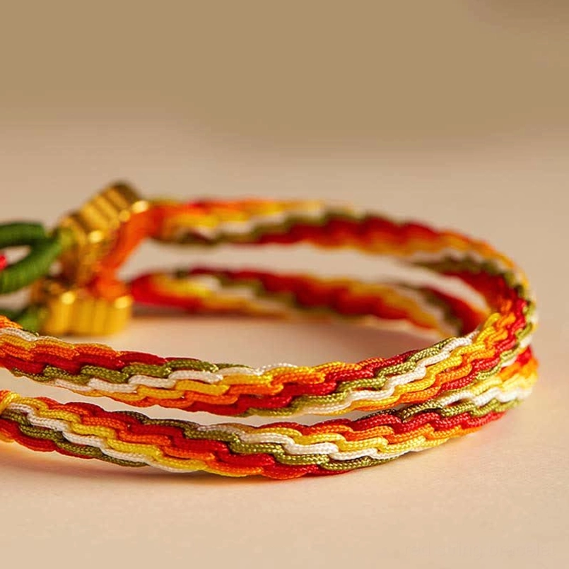 Tibetan blessed red cord bracelet with reincarnation knot and protective energy