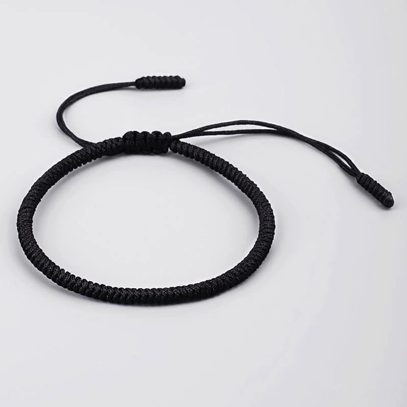 Tibetan amulet bracelet showing traditional hand-knotted weaving technique