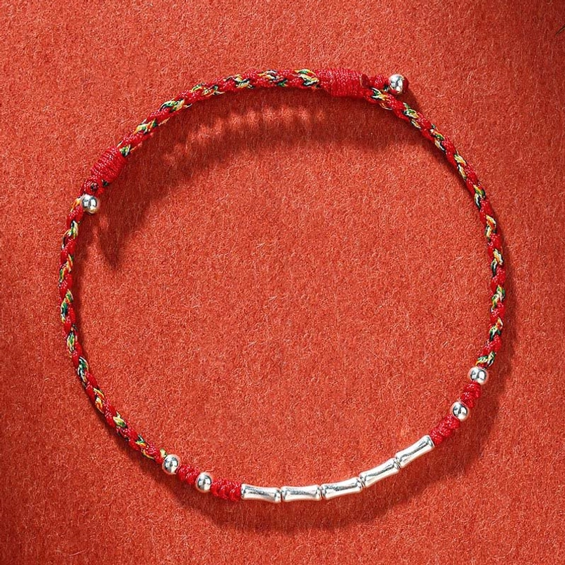 Handmade Tibetan multicolor bamboo protection bracelet with adjustable knot and metal beads