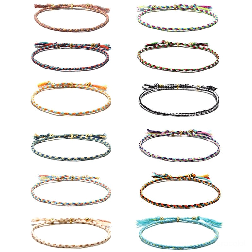 12-piece handmade Tibetan braided rope tassel bracelet set with multiple color combinations for complete harmony