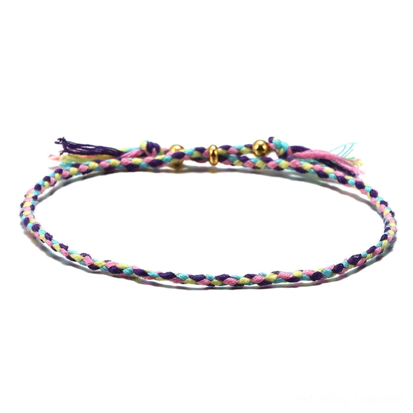 Handmade Tibetan braided rope harmony bracelet in purple and blue tones for spiritual energy