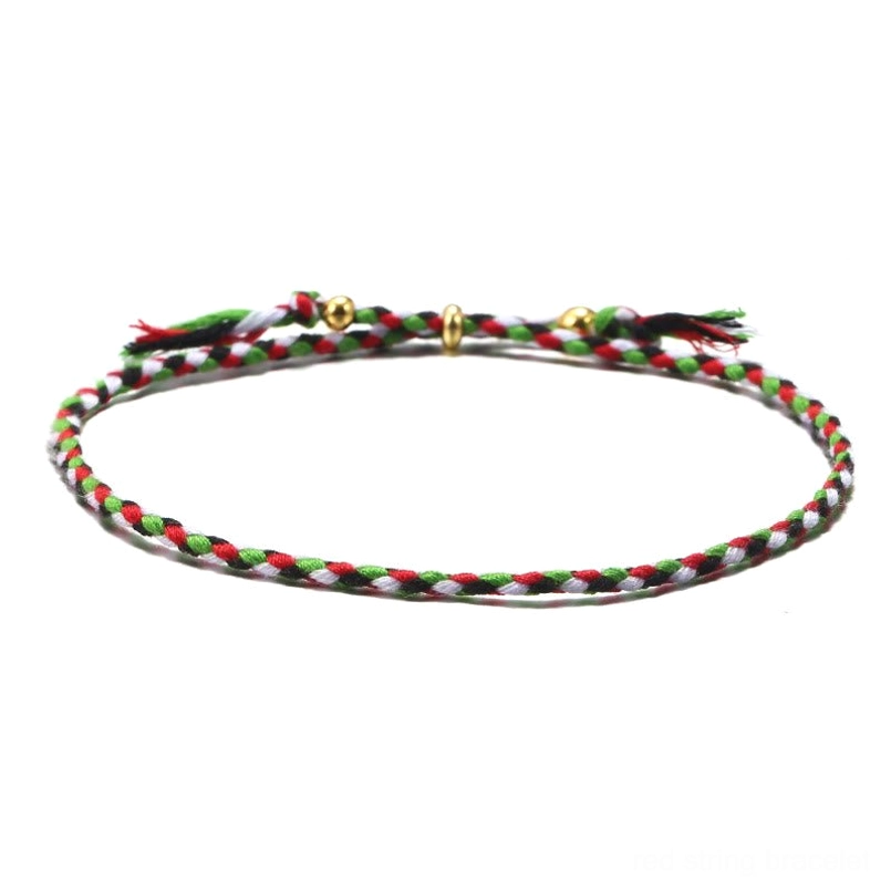 Handmade Tibetan braided rope tassel bracelet in red, green and black mixed tones for protection and balance