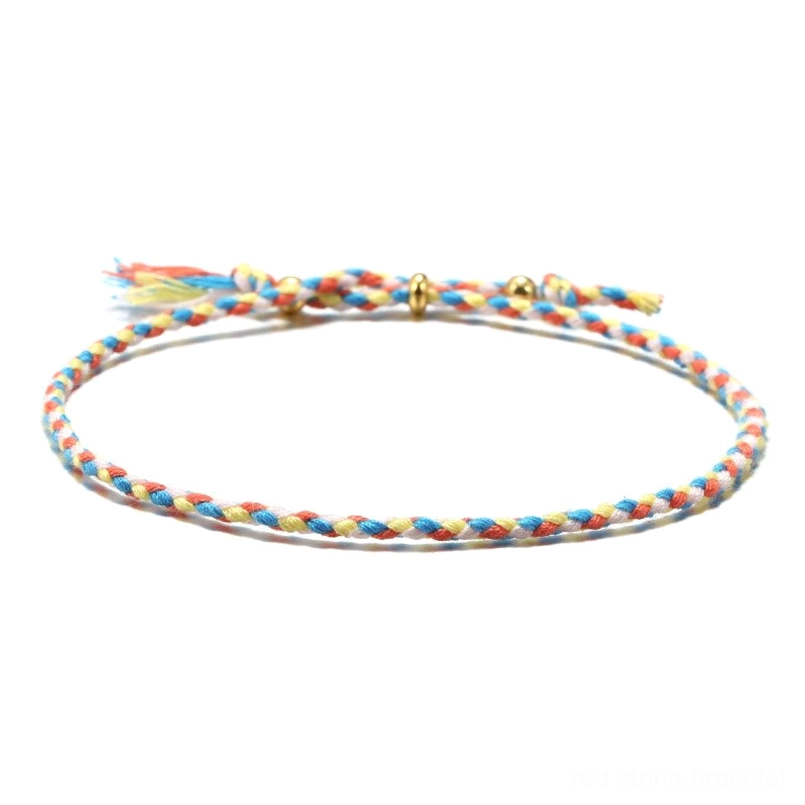 Handmade Tibetan braided rope tassel bracelet in yellow, blue and orange mixed colors for wisdom and creativity