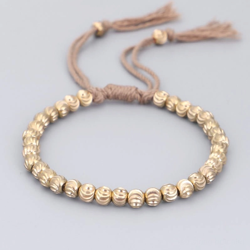 Tan brown tibetan handmade copper bead bracelet with adjustable closure