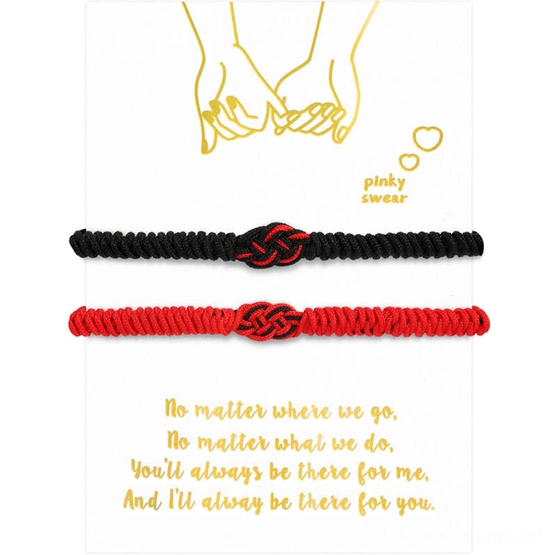 Romantic Tibetan red string couple bracelets displayed on greeting card with red and black styles