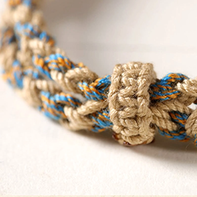 Tibetan Dzi Bead red string bracelet product detail shot of braided rope texture