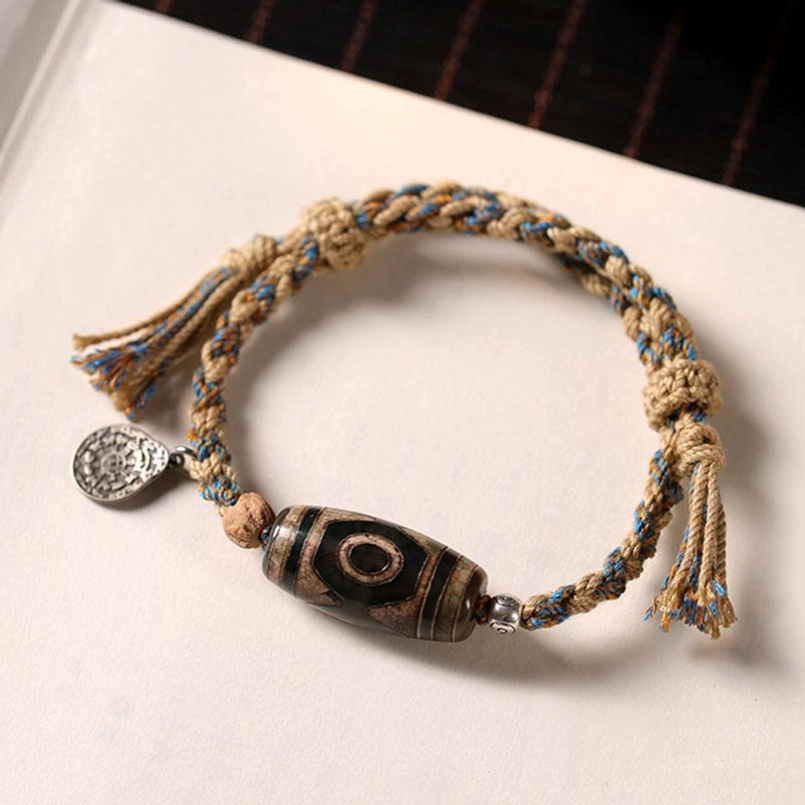 Tibetan Dzi Bead protection bracelet with two-eye pattern and metal charm