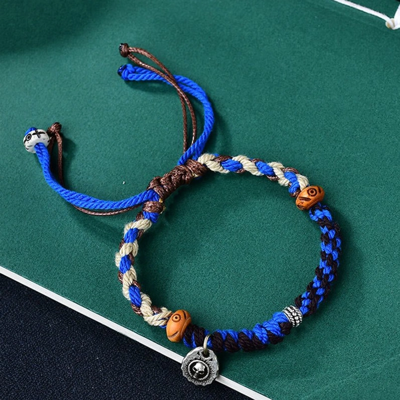 Blue Tibetan hand-woven Garuda luck bracelet with white khaki cord and wooden beads