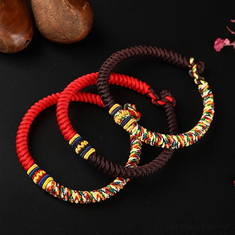 Three-piece set of Tibetan braided King Kong Knot bracelets in red, brown, and multicolor variations