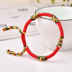 Red adjustable handmade Tibetan King Kong knot protection bracelet with multicolor blessing cord details