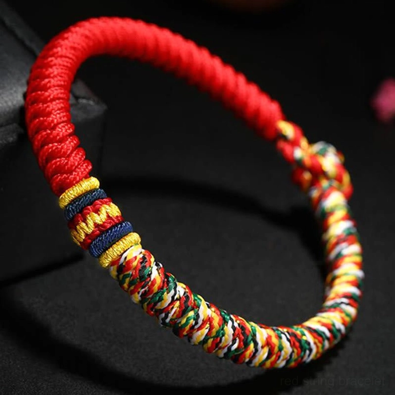 Red Tibetan King Kong Knot bracelet showing clear braided texture and colorful woven details