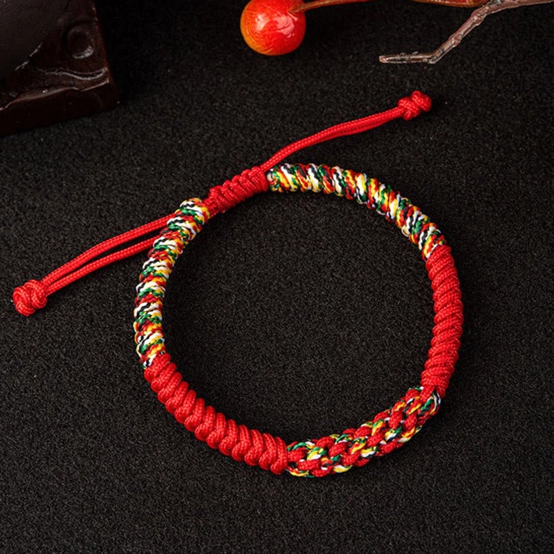 Multicolor Tibetan King Kong Knot bracelet flat lay overhead view showing full woven design