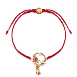 Tibetan lotus koi fish red string bracelet with gold charm on white background - front flat lay view